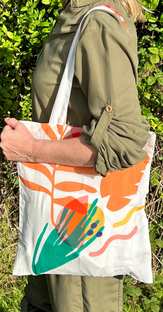 Mozzie Cozzie tote bag in tropical summer earth print.